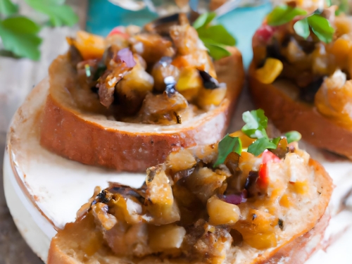 Eggplant Caponata Crostini (24 Pieces)